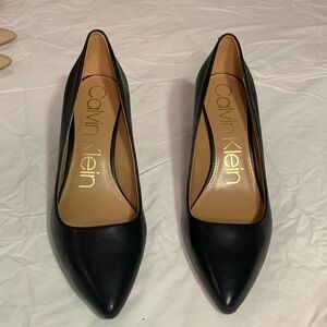 Calvin Klein black 3 inch leather heels. Never worn.